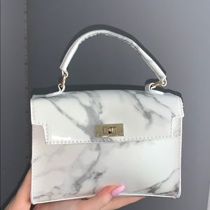 Marble print clutch/crossover bag